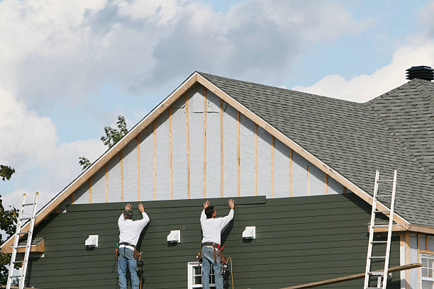 Professional Emergency Siding Repair technician working in Mogadore, OH